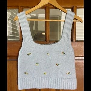 Strangers & Lovers, Light blue knit tank style cropped top with flower detail